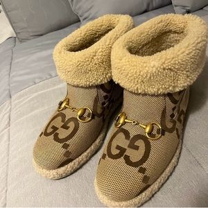 Gucci “Féria” GG Pattern Fur Lined Ankle Boots